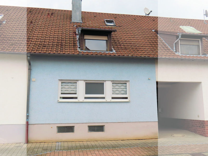 Reihenmittelhaus mit Garage und Garten in WEG-Teilung